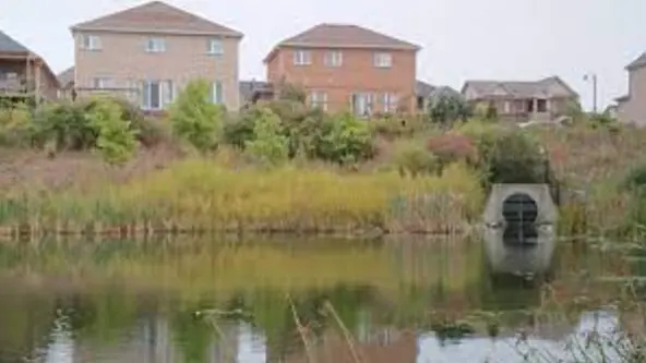 houses & stormwater outfall draining into Lake Simcoe in Ontario, Canada via LSRCA, KISTERS customer
