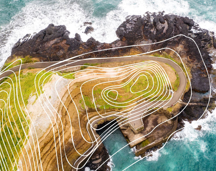 aerial photo of an island with topographic lines