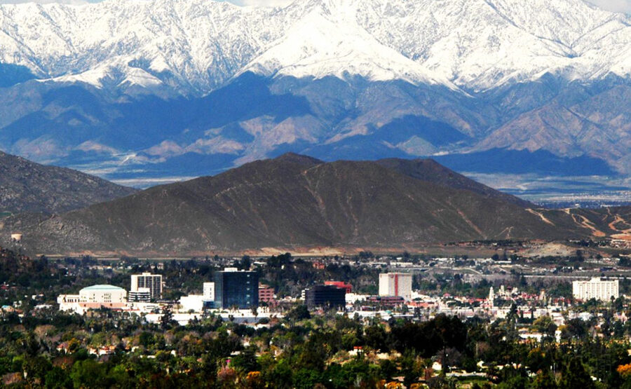 photo city of Riverside, seat of the County of Riverside, California with multiple mountain ranges in the background