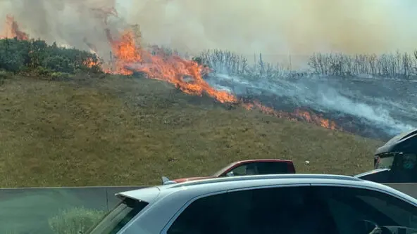 roadside fire at Parley's Canyon, Utah as local, state & federal governments mitigate fire risk via KUTV