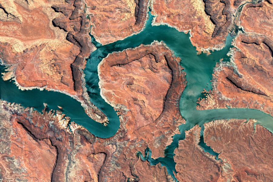 photo aerial Colorado River blue-green river against orange-colored land