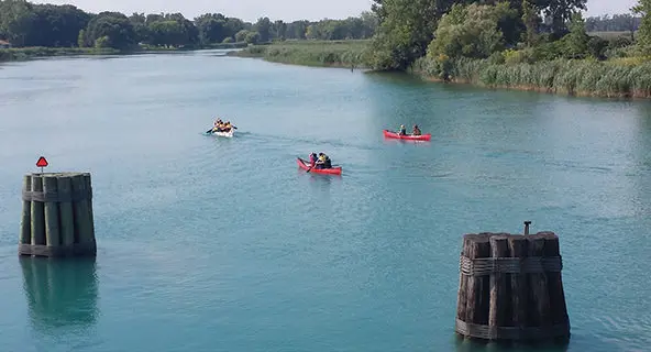 photo of three kayaks on the Antler River in Ontario, Canada