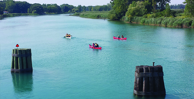 photo of three kayaks on the Antler River in Ontario, Canada