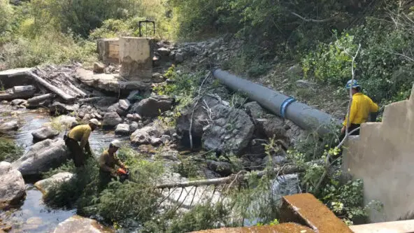 clearing debris near water diversion structure to protect water quality after Grizzly Creek Fire 2020