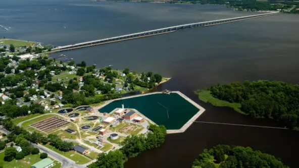 Chesapeake Bay with wastewater treatment plant in foreground via W. Parson, Chesapeake Bay Program