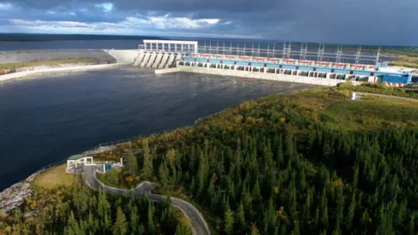 La Grande-1 hydropower generating station during a storm; rain in distance via HydroQuebec.com