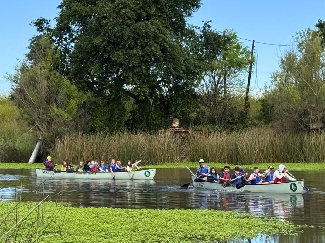 middle school students paddle 2 canoes on Cosumnes River - Middle Slough | pc Wilderness Inquiry